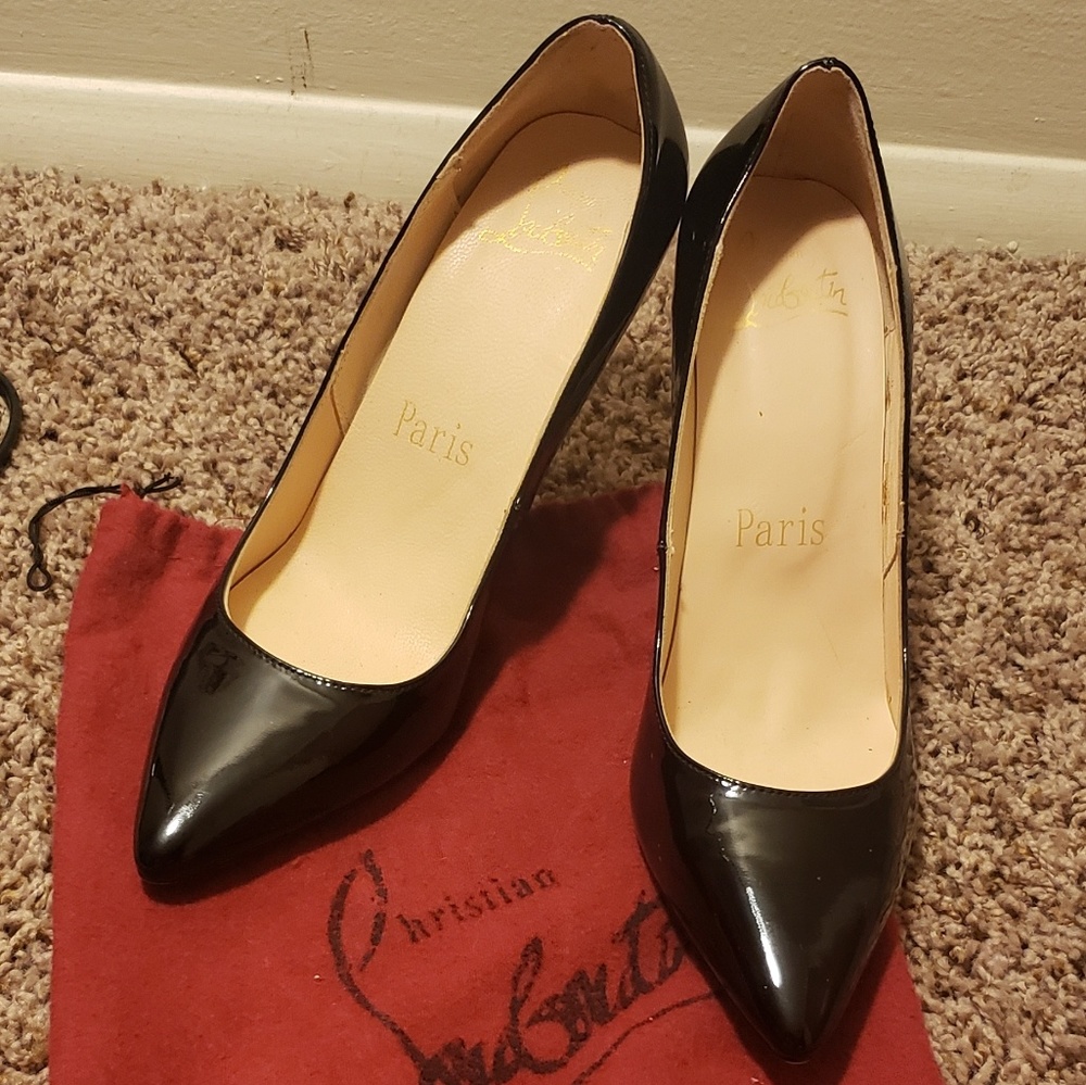 Christian Louboutin pumps & dust bag.